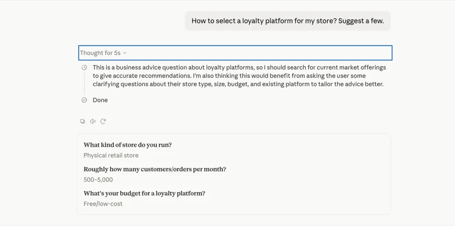 Claude asking clarifying questions about store type, order volume, and budget before answering a loyalty platform query